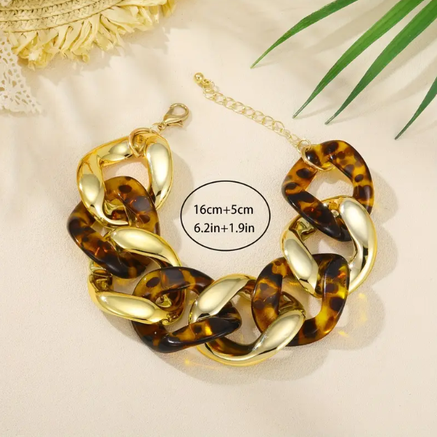 Make a bold statement with our Gold Plated Thick Tortoise Brown Weaved Chain Links Bracelet, a must-have trending piece.