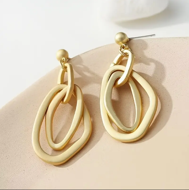 Make a statement with the Rusted Gold Plated Geometric Irregular Ovals Dangle Earrings, featuring an artistic, vintage-inspired design. Shop now at Mozzimo Jewelry!
