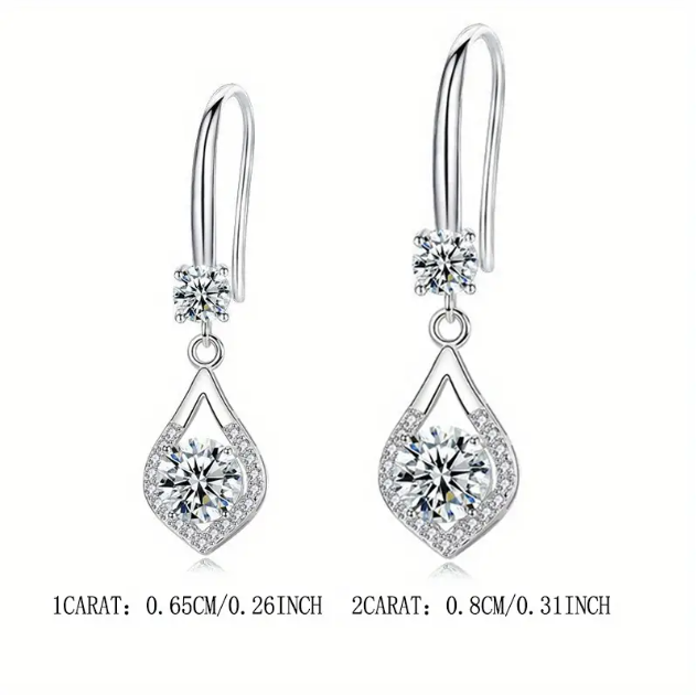 Enhance your elegance with the Sterling Silver Cubic Zirconia Rhinestone Water-Drop Earrings, featuring a timeless teardrop design with dazzling CZ stones.