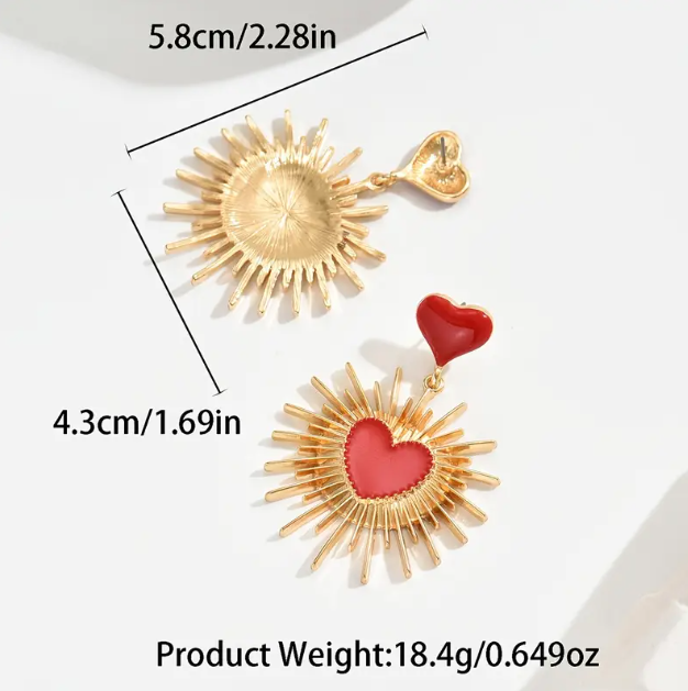 Make a bold fashion statement with Mozzimo Jewelry’s Gold Plated Sunburst Black Heart Dangle Earrings.