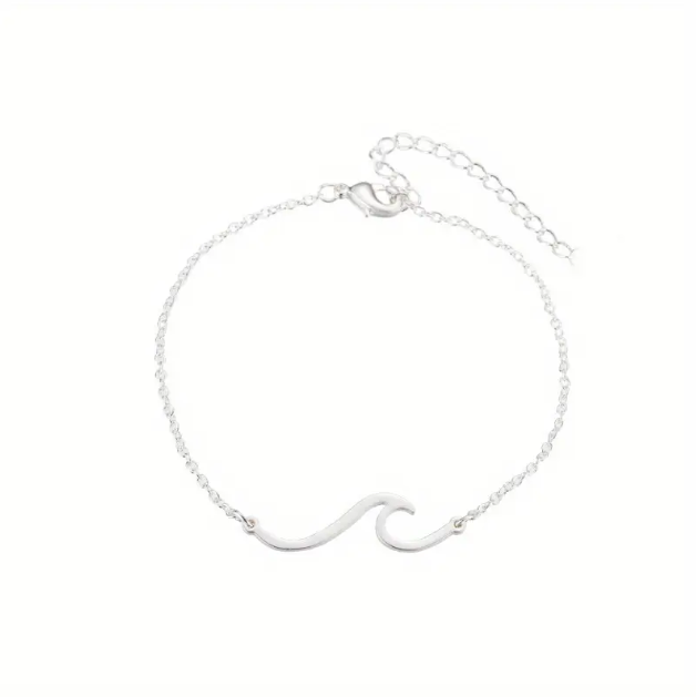 Ride the wave of minimalist elegance with our sterling silver ocean wave chain bracelet — a beach-chic staple available now at Mozzimo Jewelry.