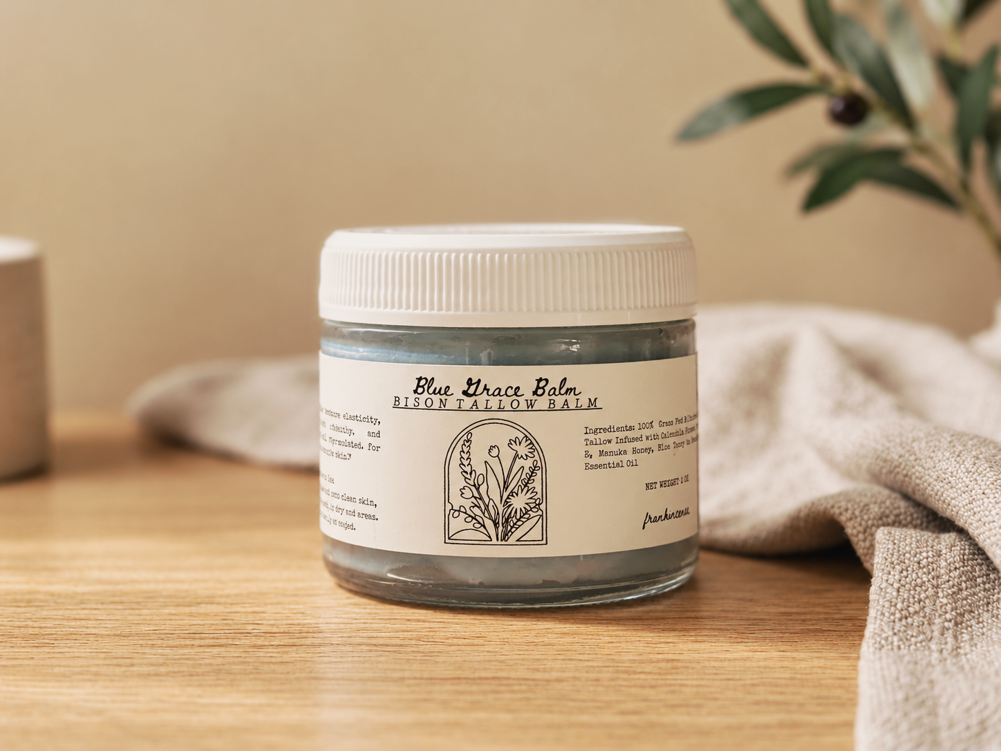 Blue+Grace+Balm+on+a+Warm+Tabletop.png