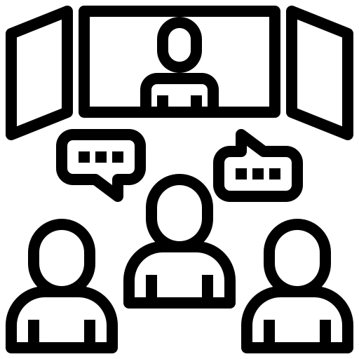 Silhouette of a person doing yoga in a meditative pose in front of a sunrise or sunset over mountains.