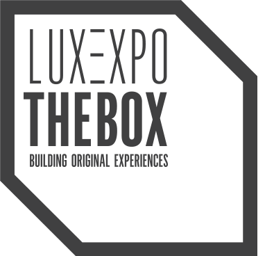 Logo for LUXE XPO THE BOX with the tagline "building original experiences" in black and gray colors.