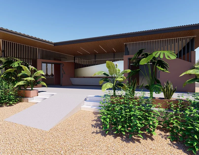 Modern house with outdoor staircase, surrounded by green plants and clear blue sky.