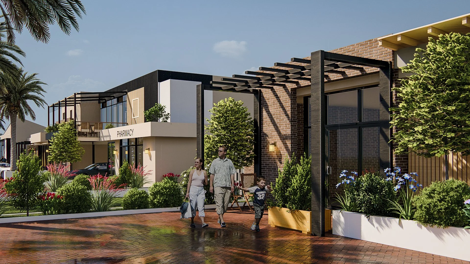 People walking past a modern shopping area with a pharmacy, surrounded by lush greenery, brick and panel buildings, and clear blue skies.