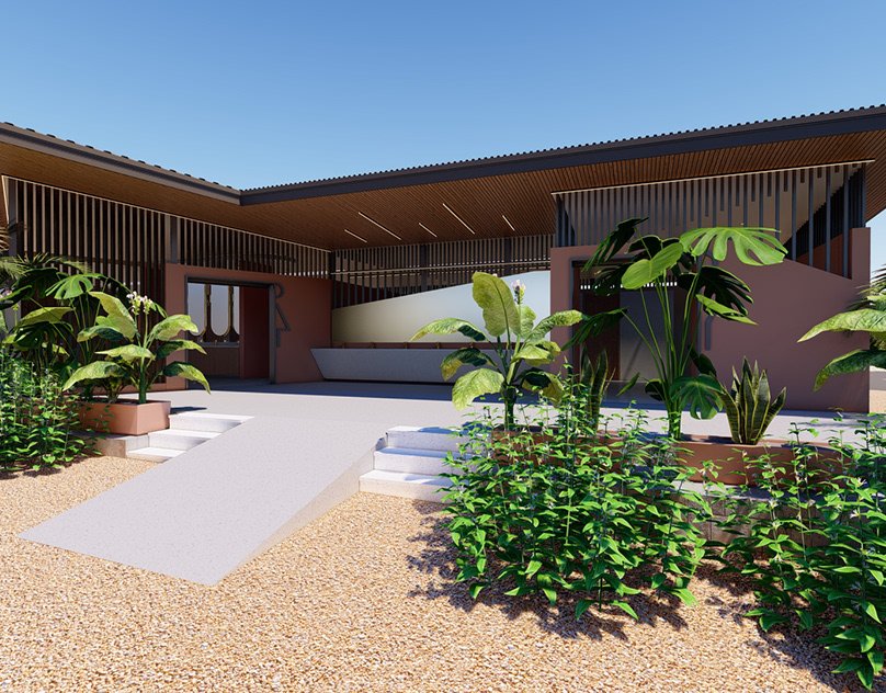 Modern house with a wooden slat roof, surrounded by lush green plants and a gravel pathway, under a clear blue sky.