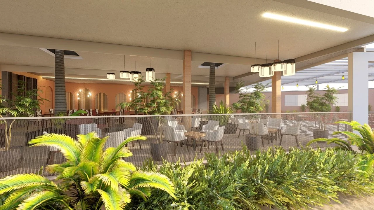 An outdoor patio area with seating, potted plants, and hanging lights under a covered roof.