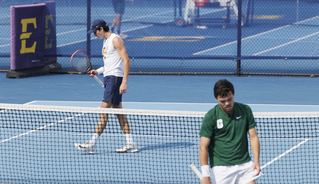 ETSU's Oscar Martinez regroups between points during a men's tennis match, 2026