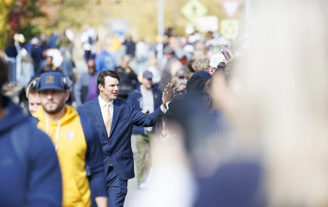 Coach Will Healy High Fives Fans ,2025