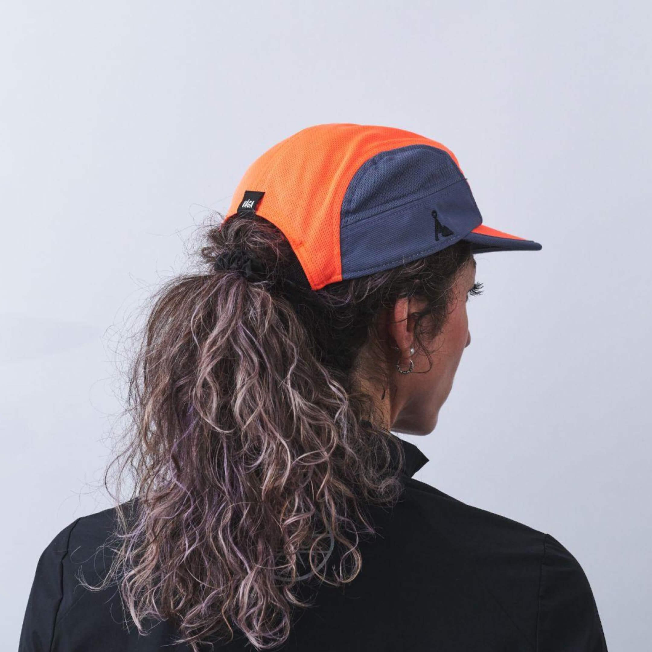 vaga-club-cap-running-cap-NeonCoral-SlateBlue-model-back-angle.jpg