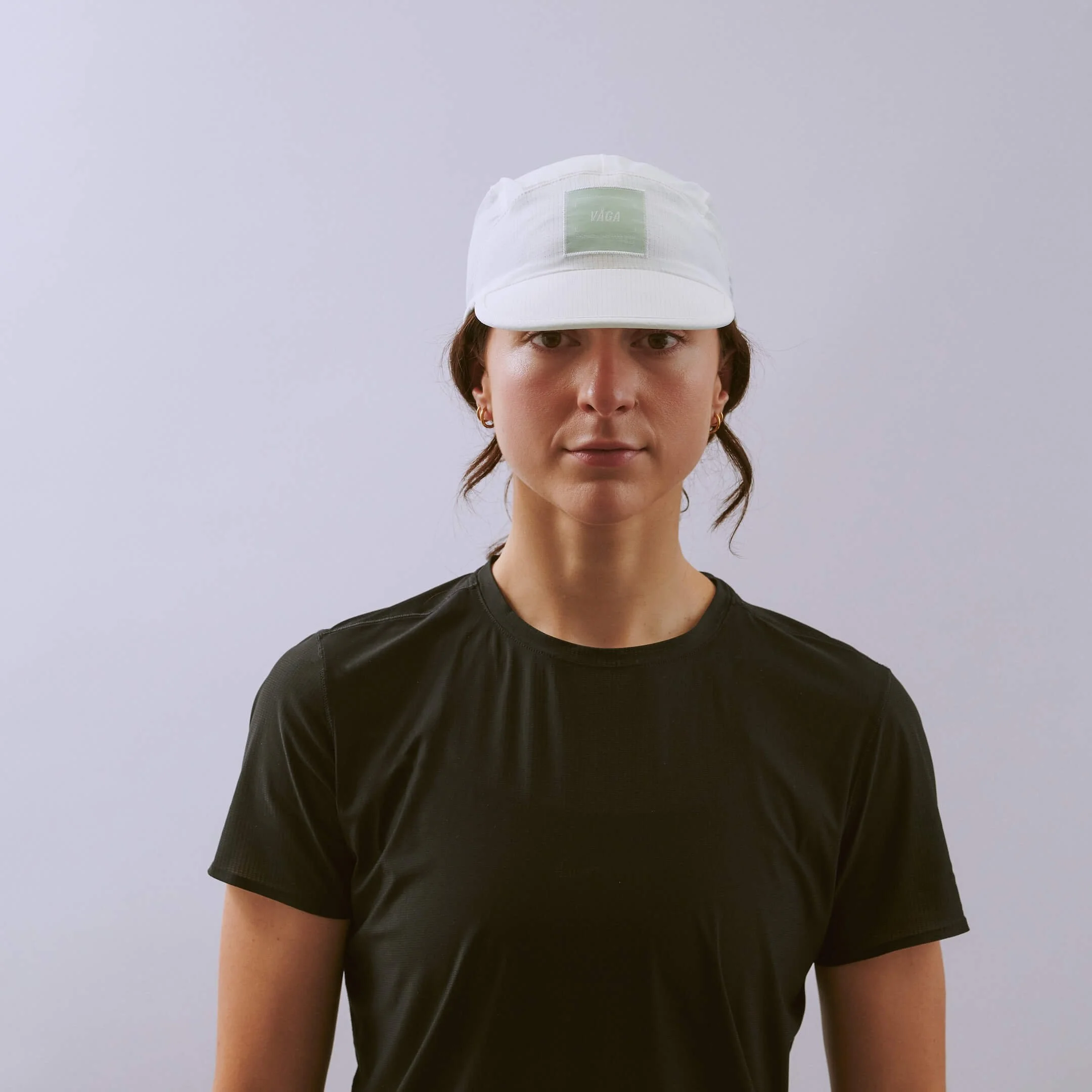 vaga-transit-lite-cap-unstructured-running-cap-white-l-model-front.jpg