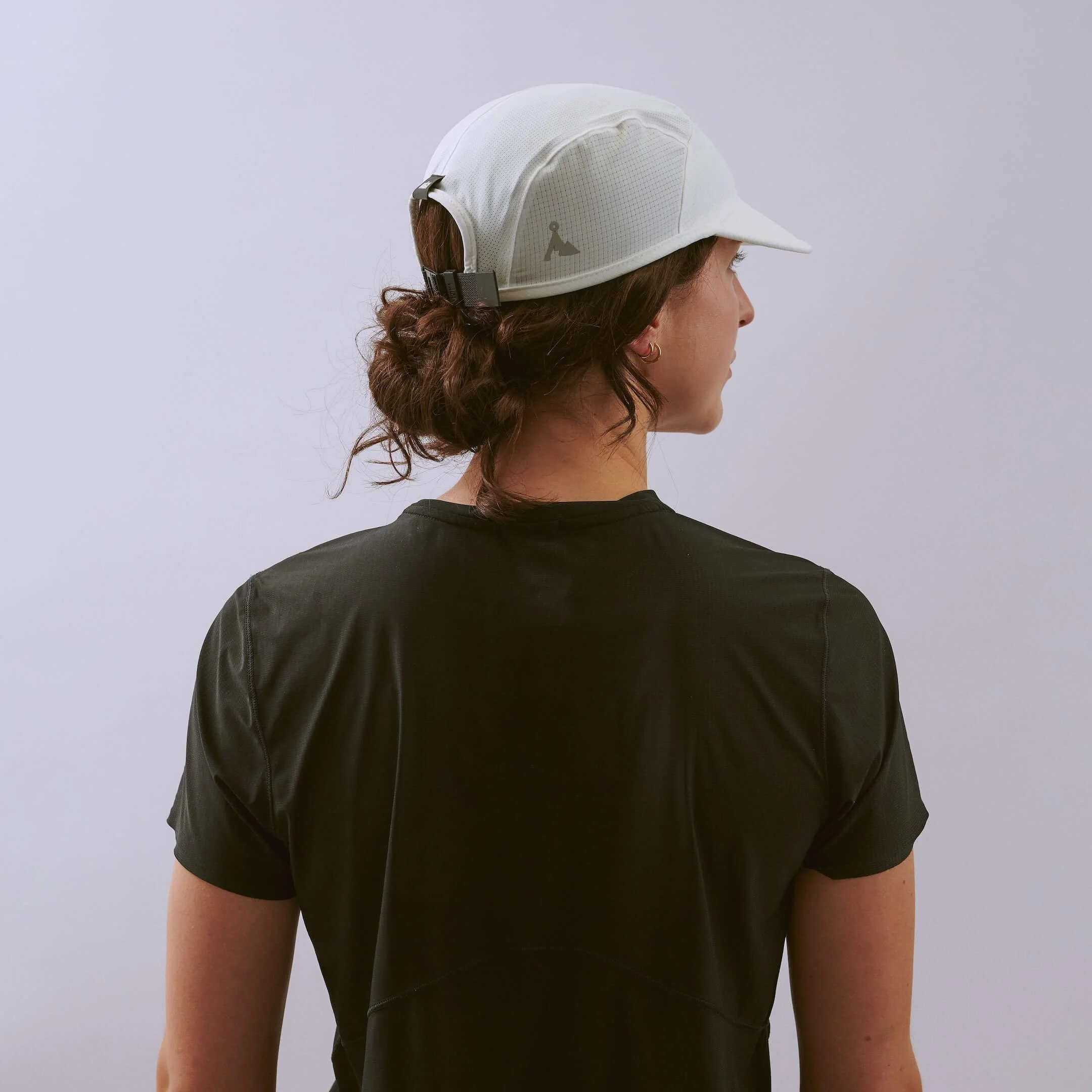 vaga-transit-lite-cap-unstructured-running-cap-white-l-model-angle.jpg