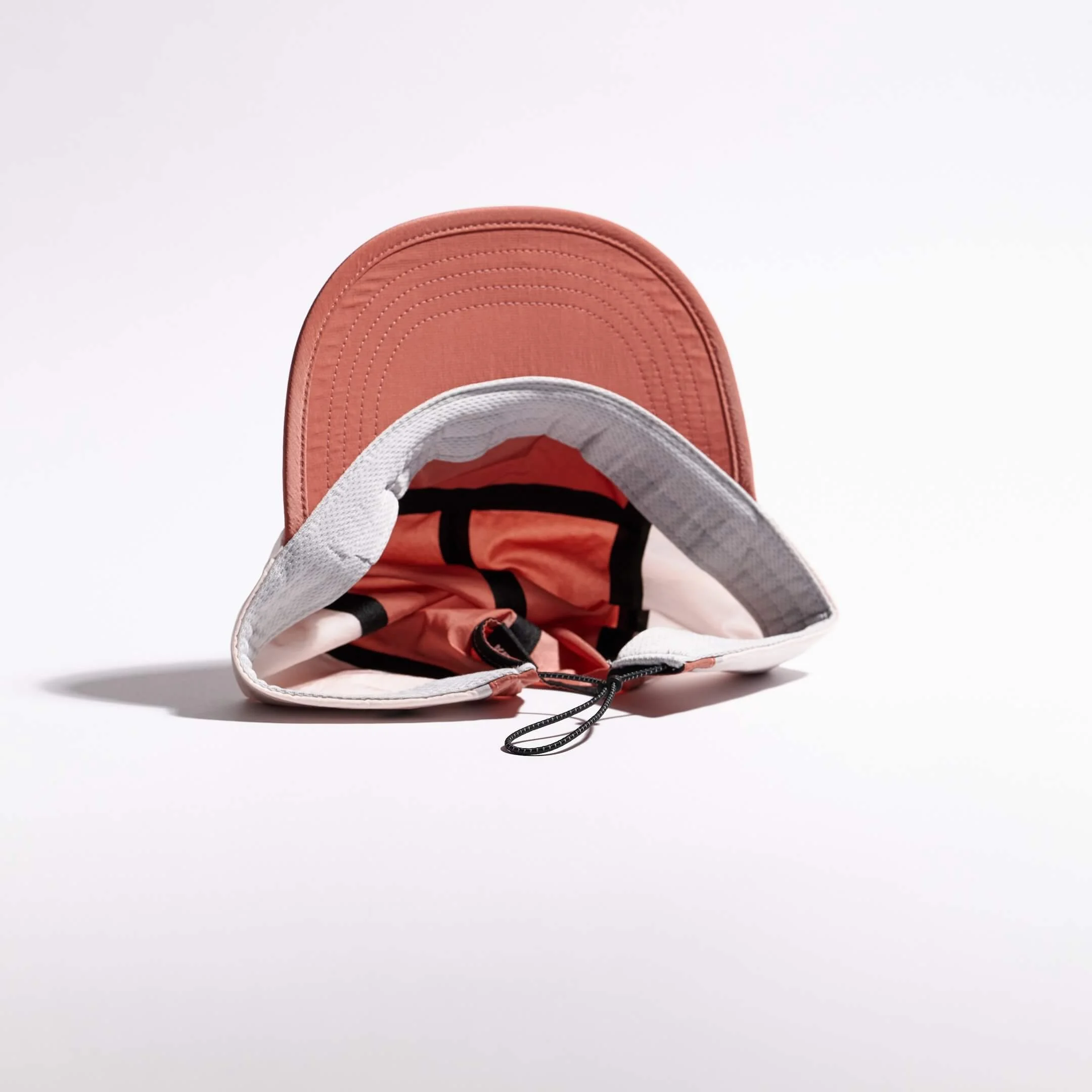 vaga-pacer-cap-running-cap-clayred-palepink-underside.jpg