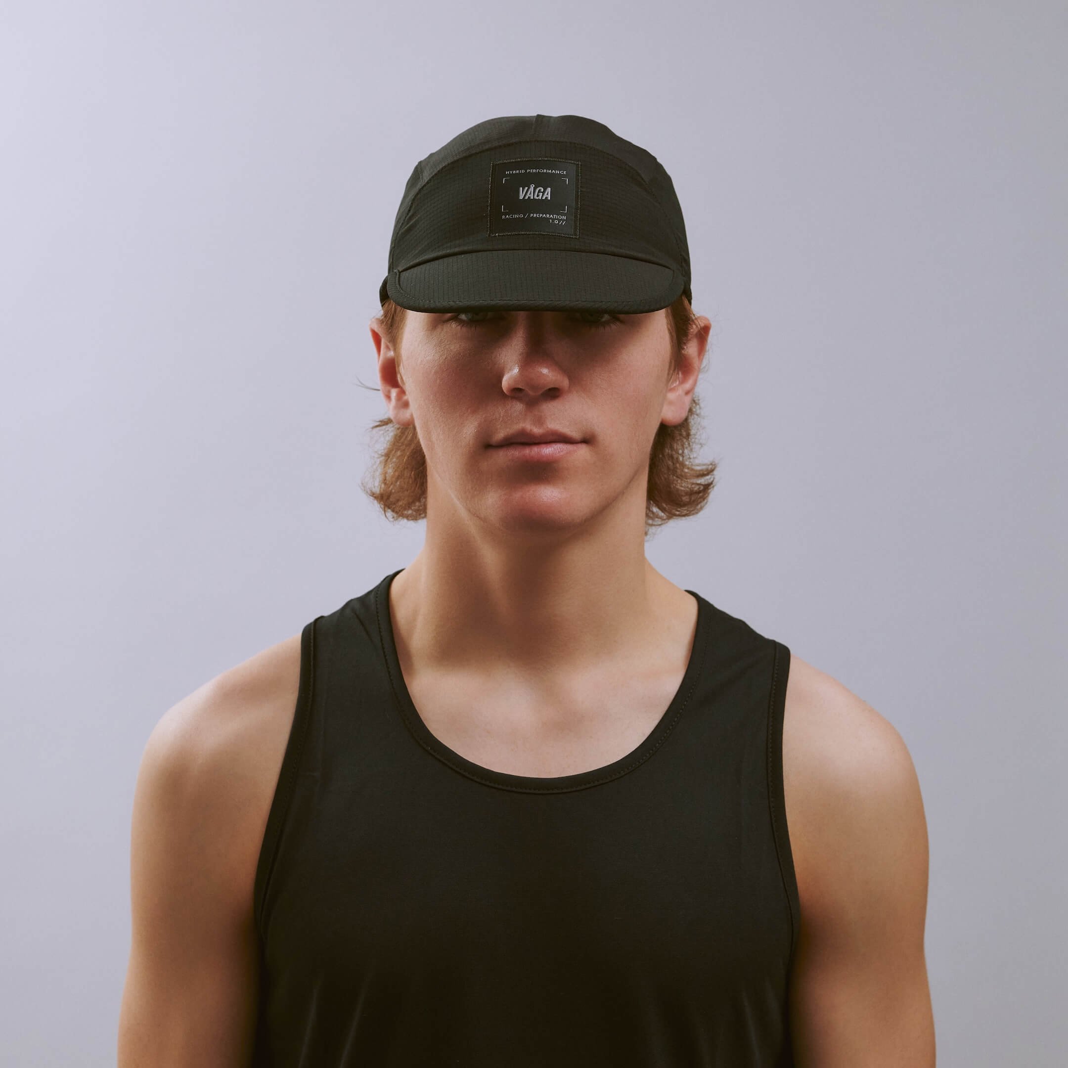 vaga-transit-lite-cap-unstructured-running-cap-black-e-model-front.jpg