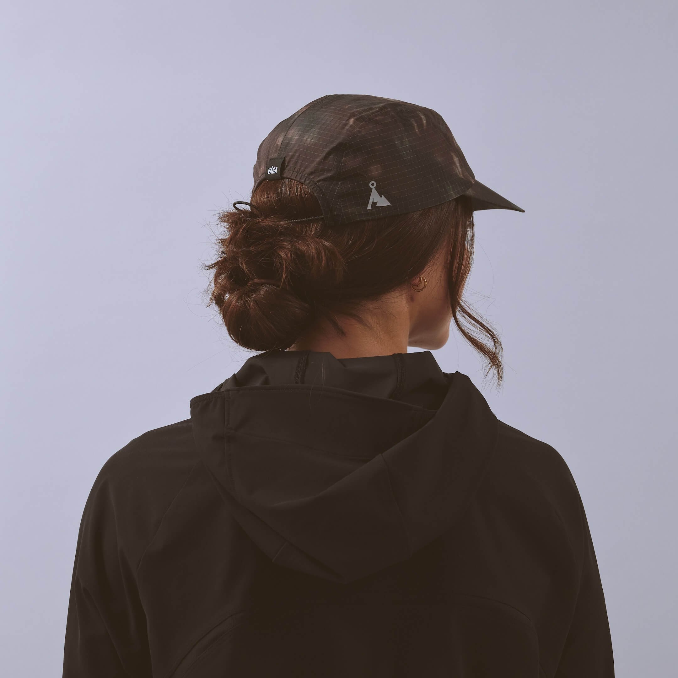 vaga-night-club-running-cap-ember-model-back-angle.jpg