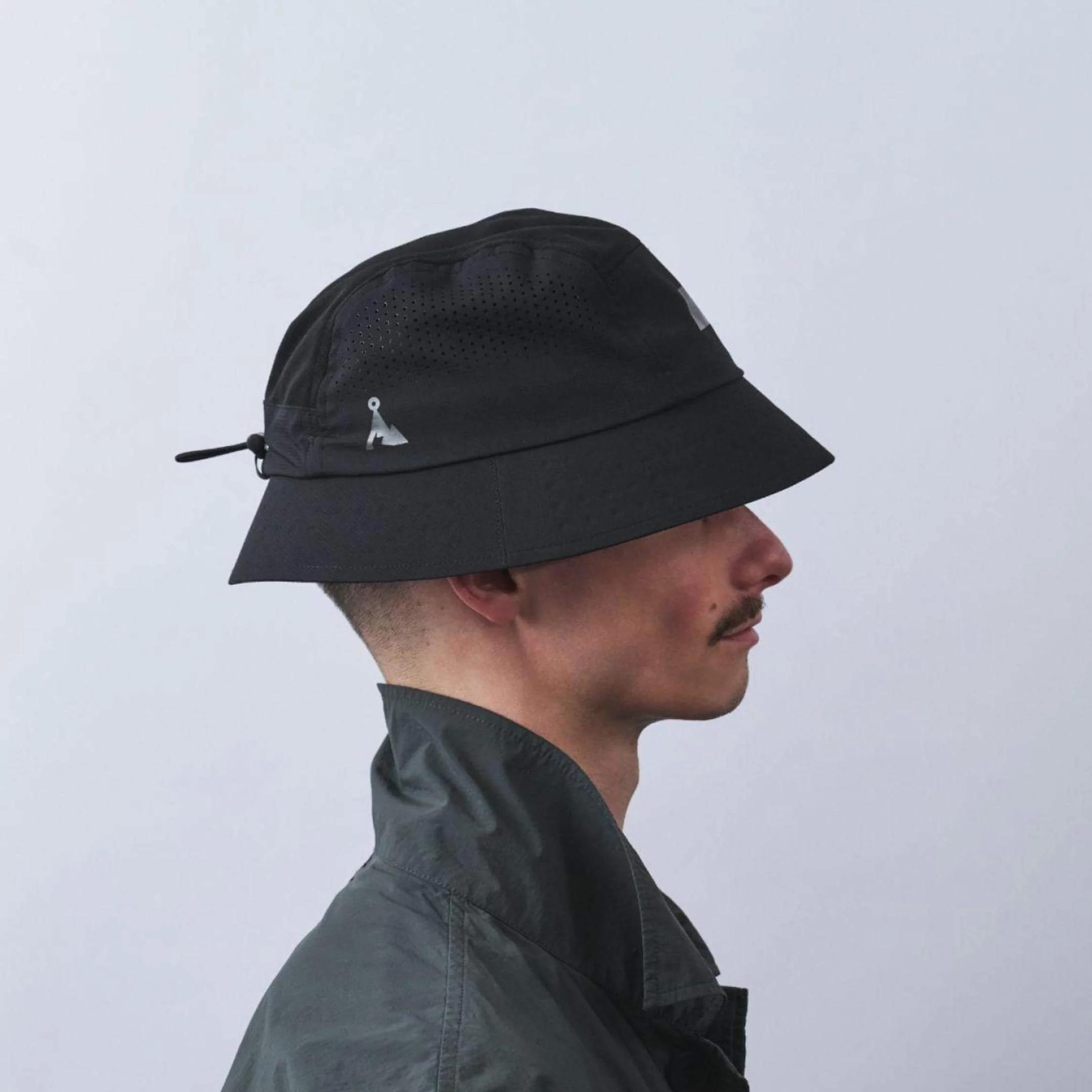 vaga-feather-racing-bucket-hat-black-model-side-profile.jpg