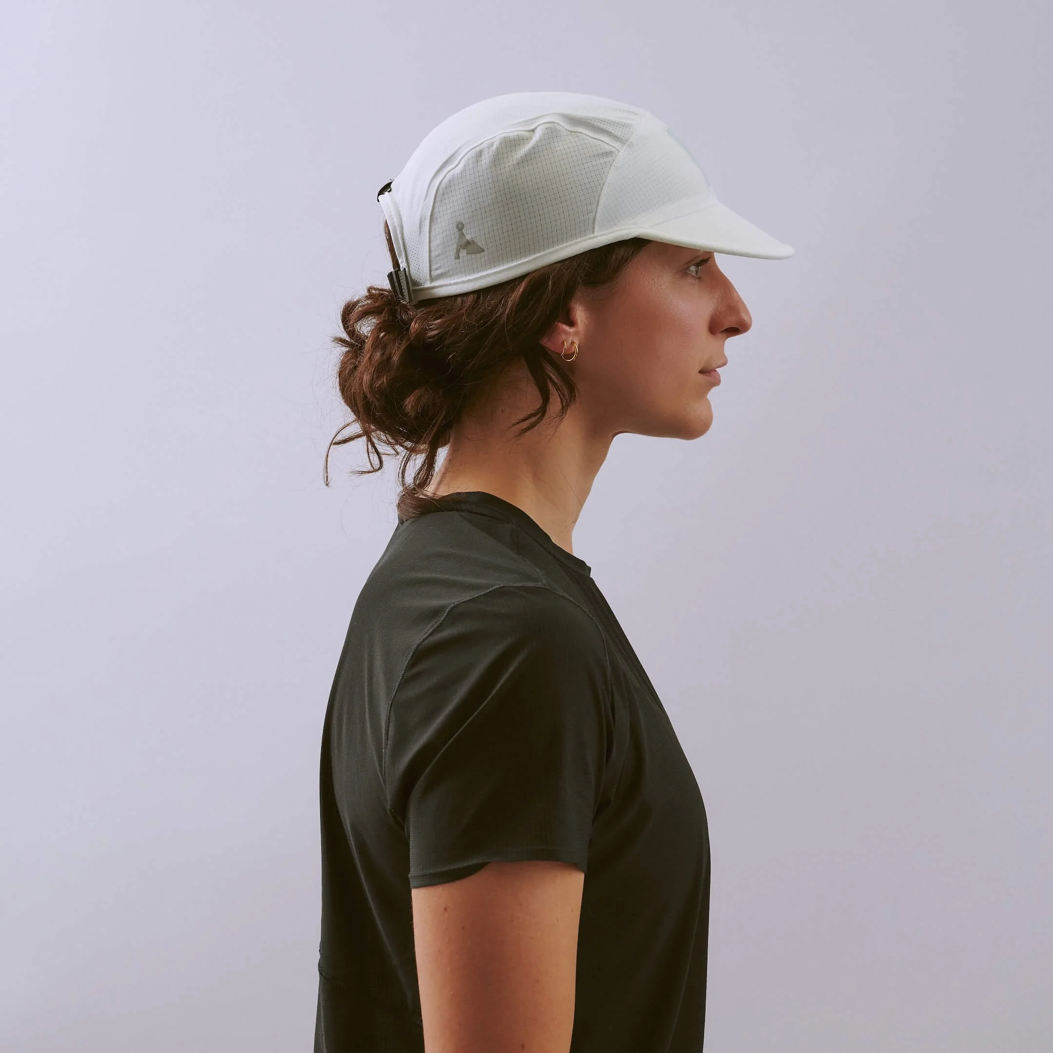 vaga-transit-lite-cap-unstructured-running-cap-white-l-model-profile.jpg
