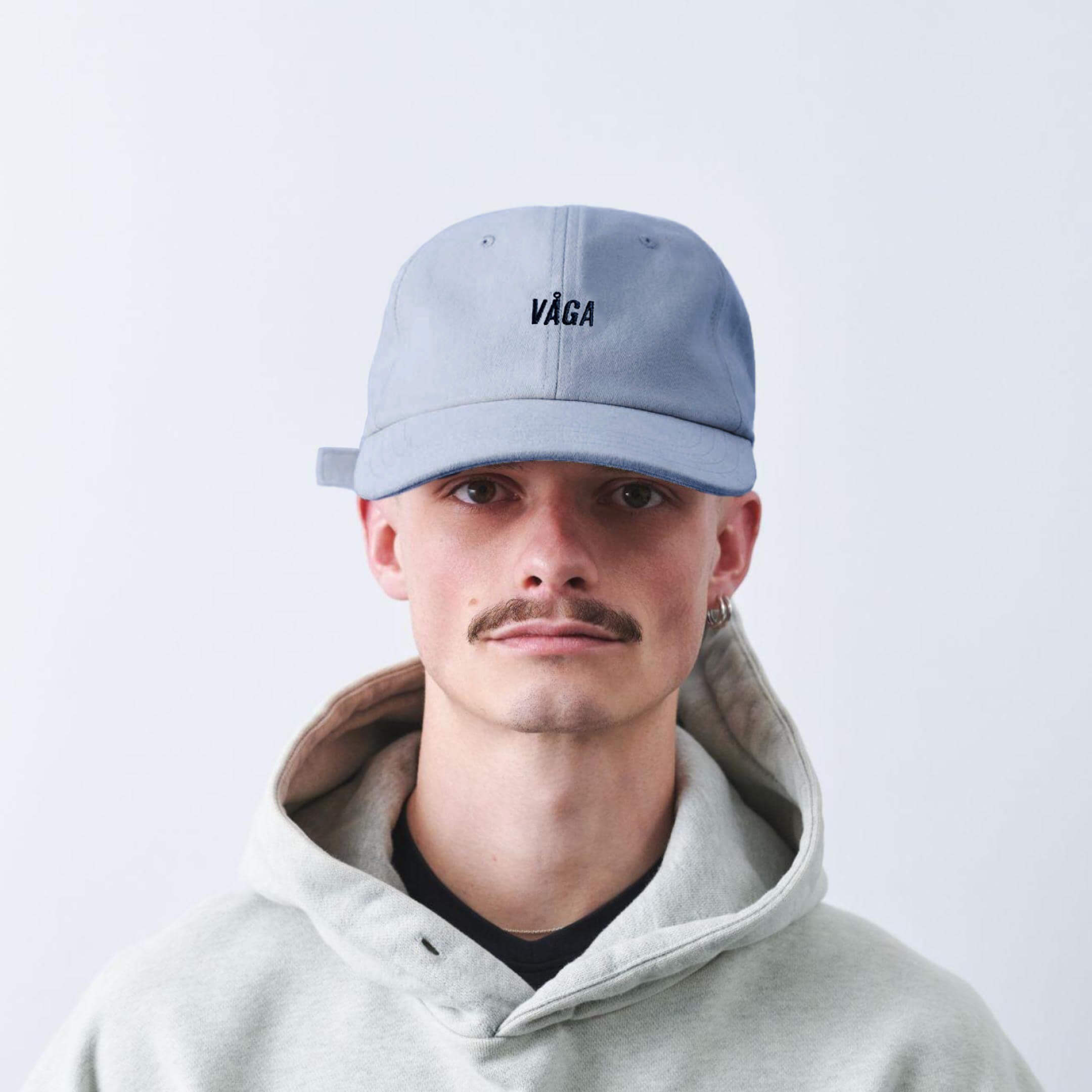 vaga-washed-cotton-cap-postalblue-model-front.jpg