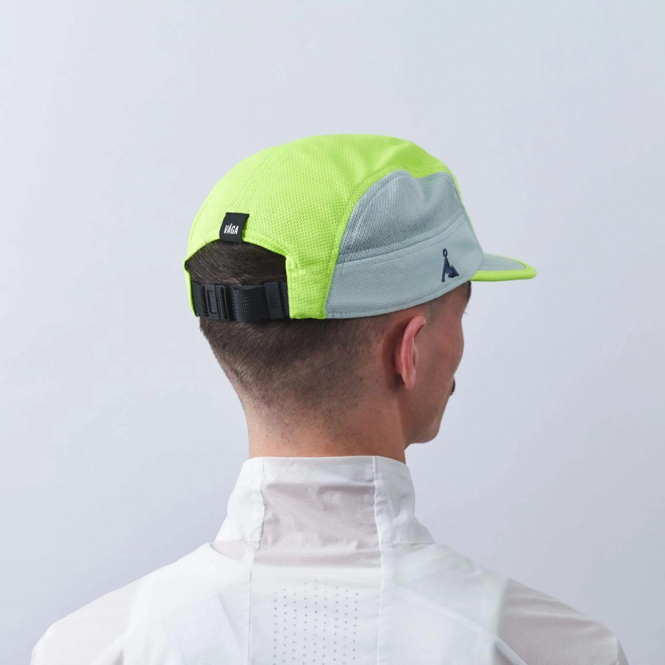 vaga-club-cap-running-cap-Mint-NeonYellow-model-back-angle.jpg