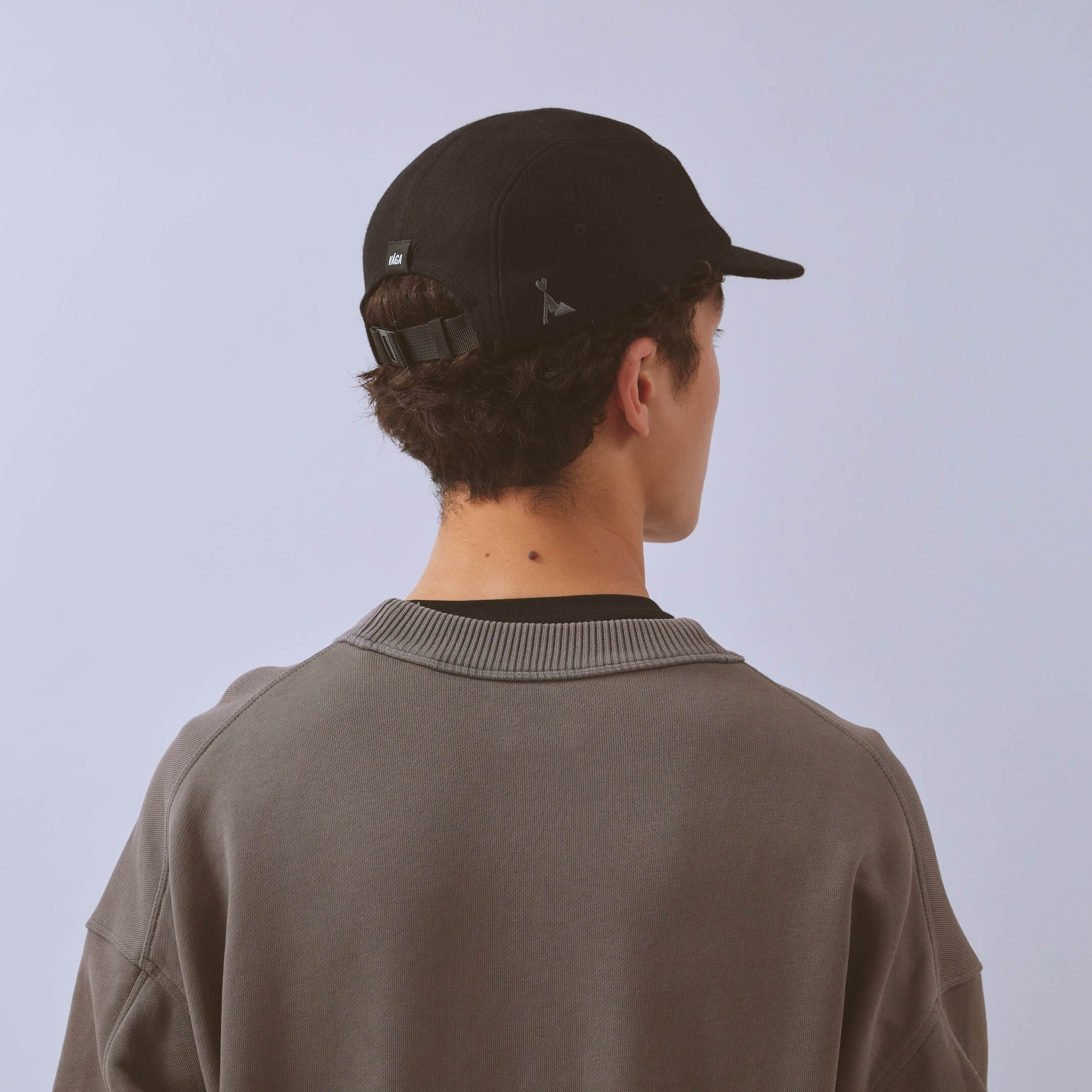 vaga-crag-cap-lifestyle-cap-black-model-back-angle.jpg