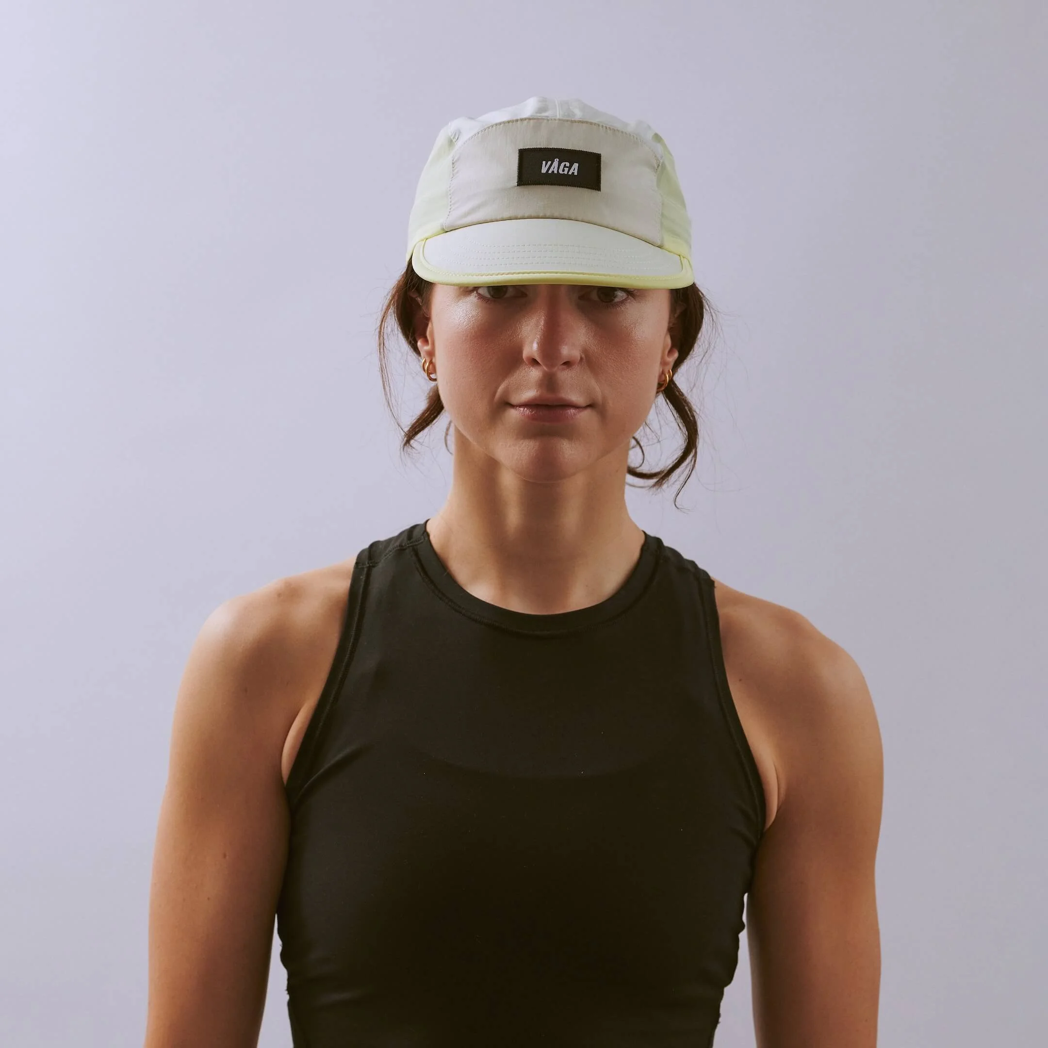 vaga-pacer-cap-running-cap-palelemon-mist-l-model-front.jpg