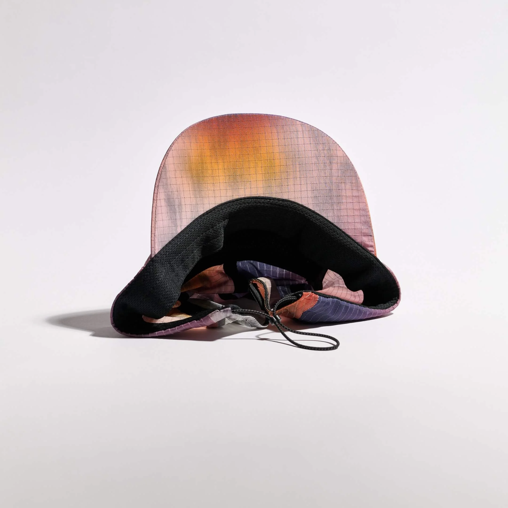 vaga-night-club-reflective-running-cap-sunset-underside.jpg