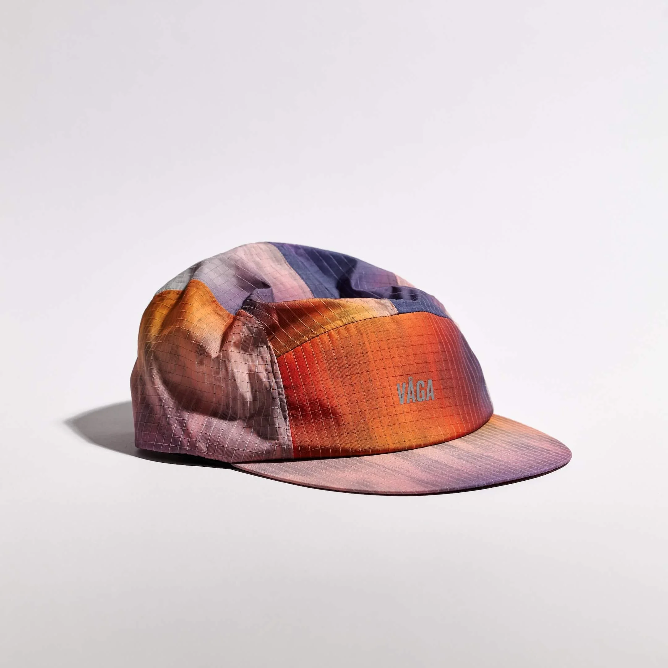 vaga-night-club-reflective-running-cap-sunset-angle.jpg