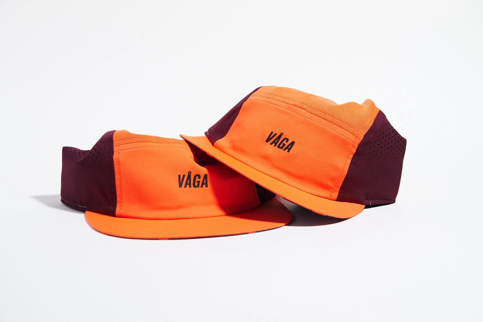 våga-feather-racing-cap-neon-orange-plum-together.jpg