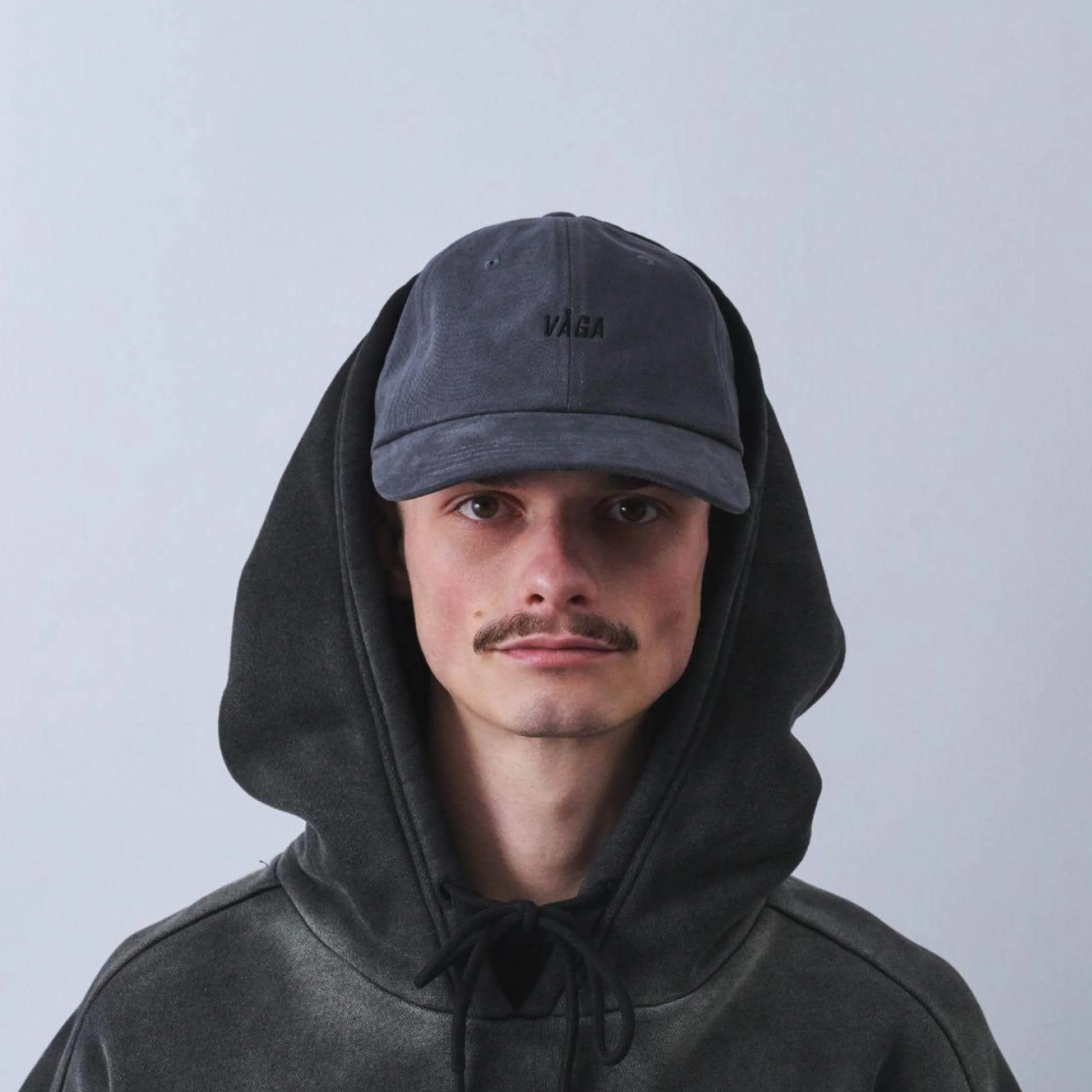 vaga-washed-cotton-cap-charcoal-model-front.jpg