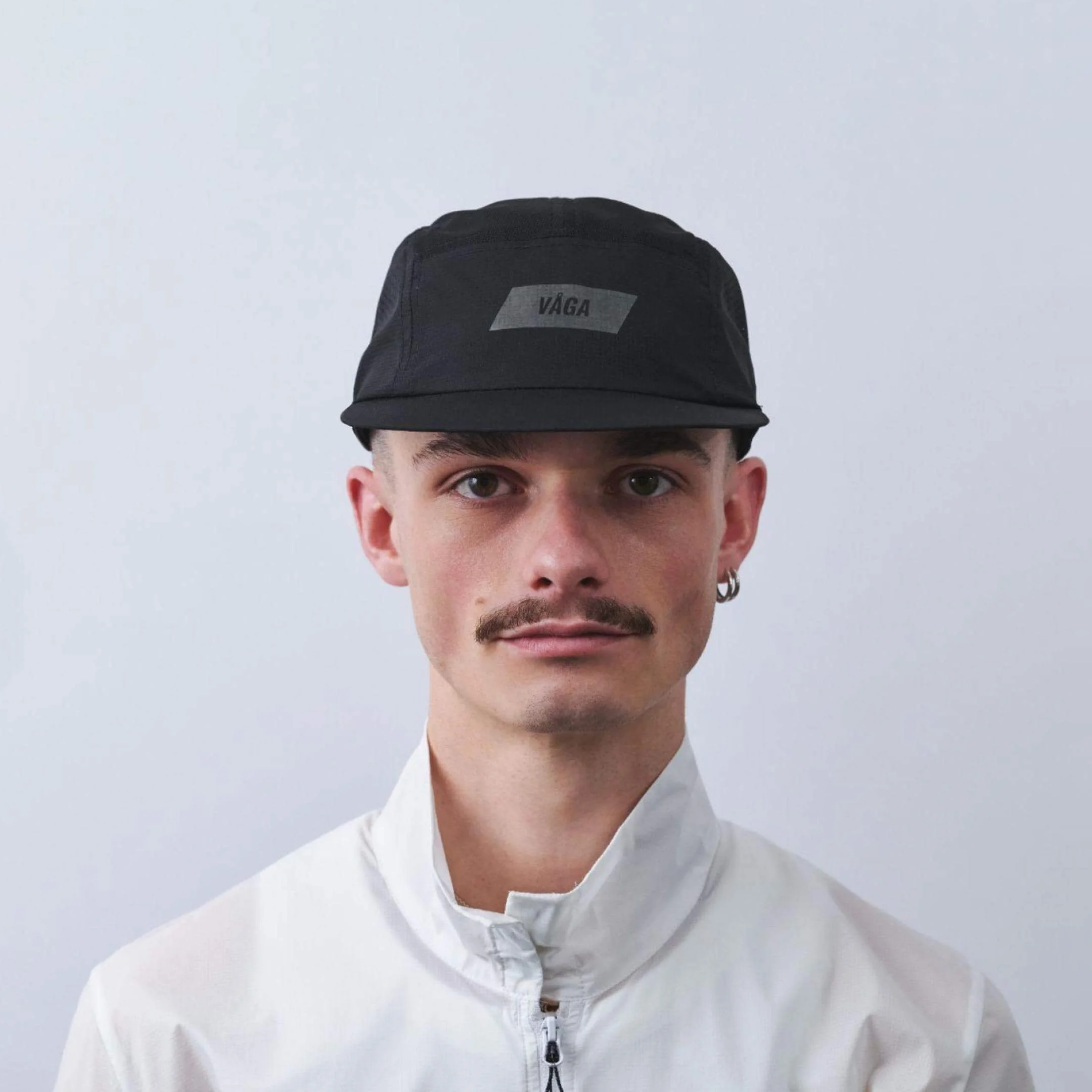 vaga-feather-racing-cap-black-model-front.jpg