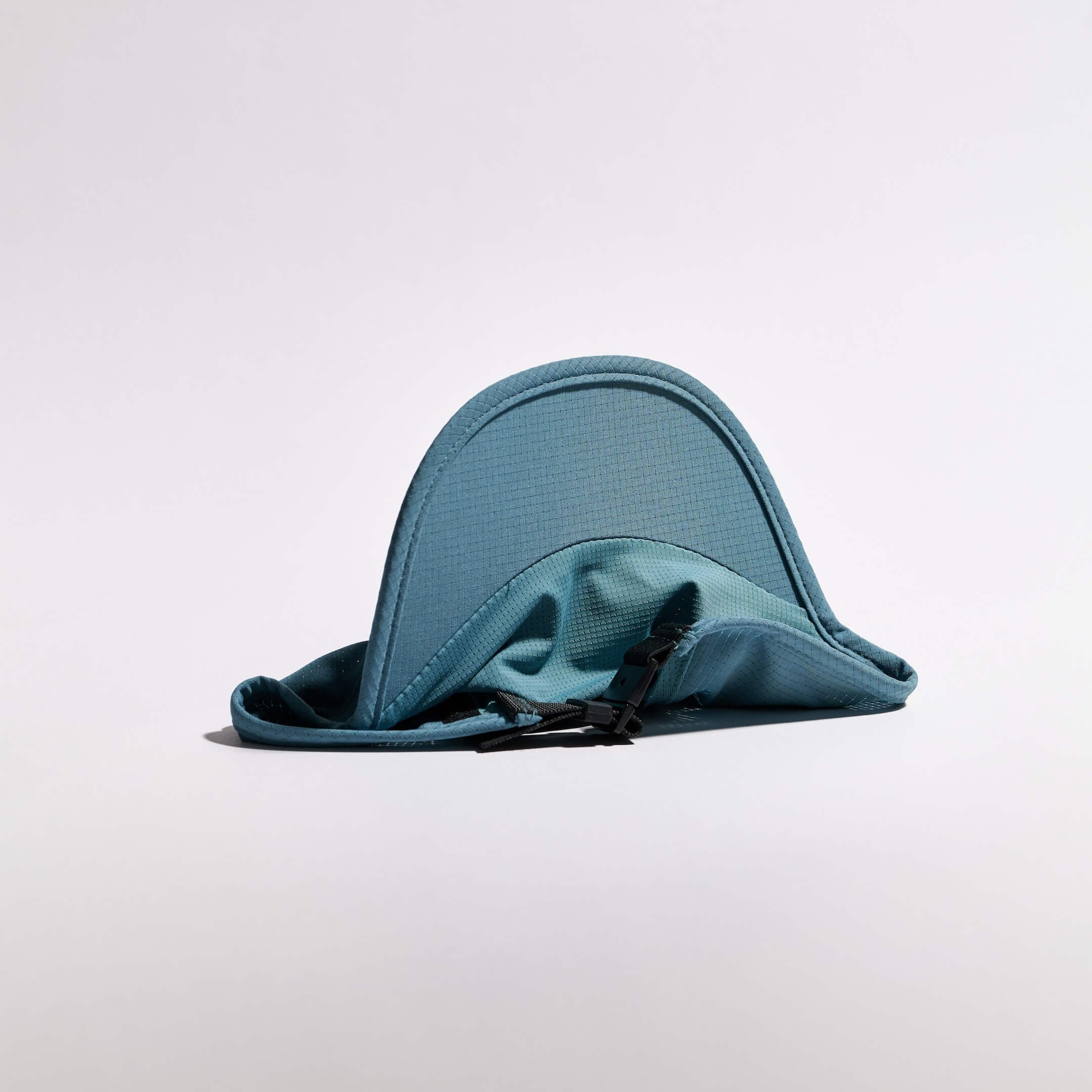 vaga-transit-lite-cap-unstructured-running-cap-teal-underside.jpg