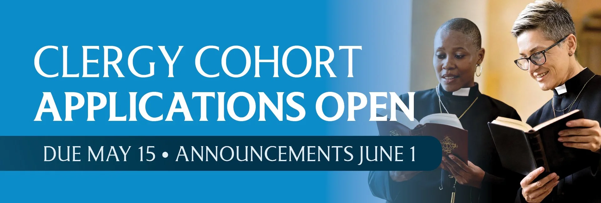 Two female clergy members talking with open Bibles next to a sign that says Clergy Cohort Applications Open, due May 15, announcements June 1