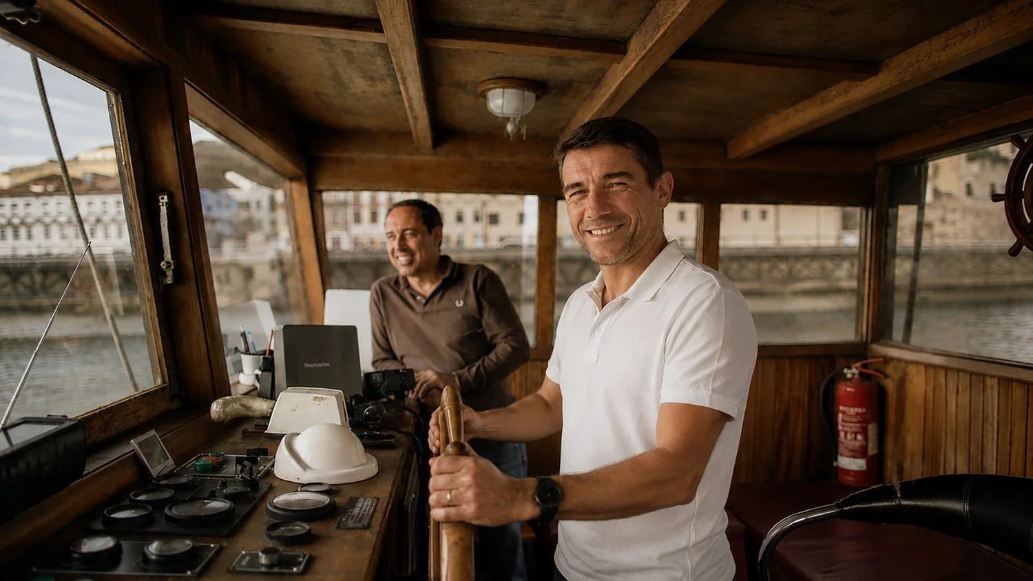 Captain at the helm of a traditional Rabelo boat