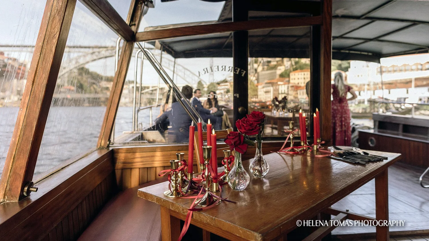Elegant table setting aboard a private Rabelo boat