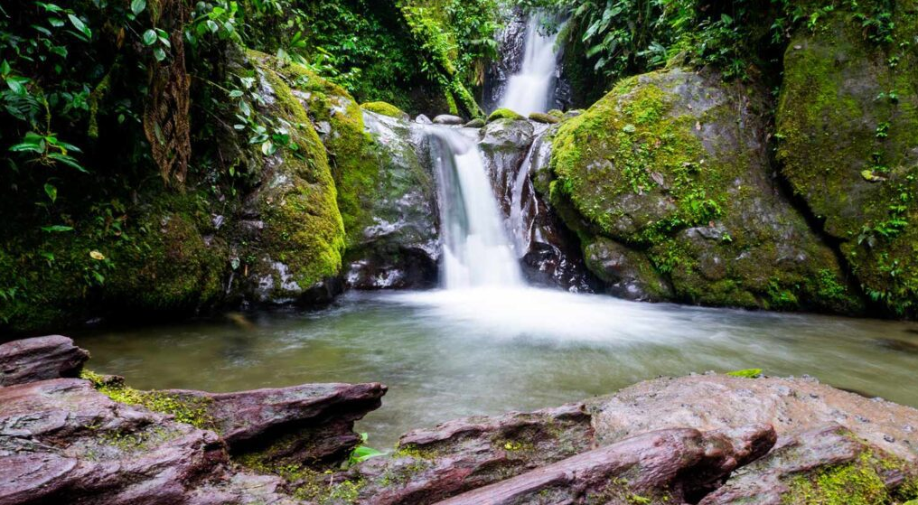 Waterfall over river
