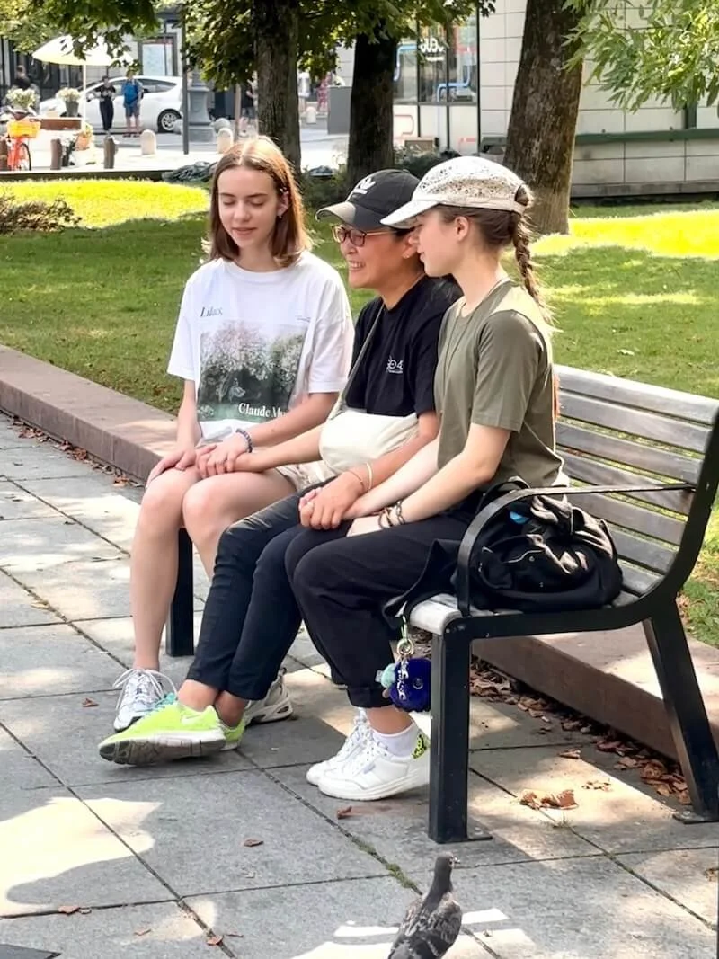 Praying on Bench.JPG