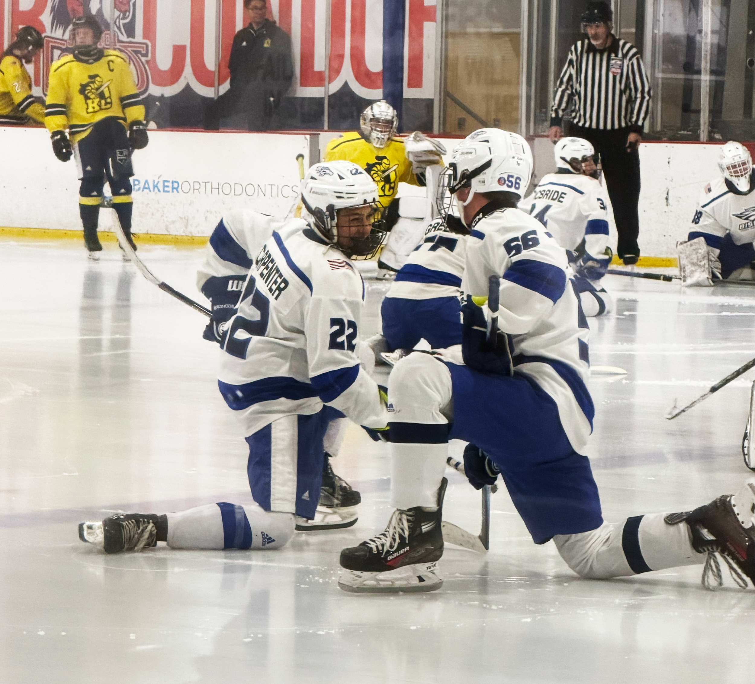 Bishop Broncos Ice Hockey Team warming up at an away game 