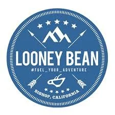 Blue circular logo with mountains, stars, a fish, and the text 'Looney Bean Fuel Your Adventure' and 'Bishop, California'.