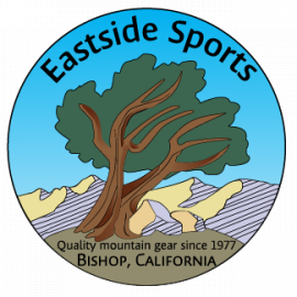 Logo for Eastside Sports featuring a large tree and mountain landscape with a blue sky, and text indicating 'Eastside Sports', 'Quality mountain gear since 1977', located in Bishop, California.
