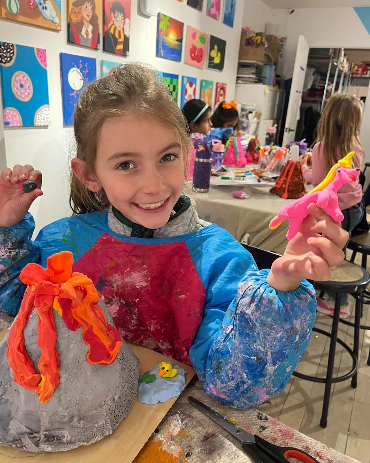 We've got active volcanoes on the table. 

Creative Journeys is our after-school class where kids experience a new medium every few weeks &mdash; painting, sculpture, weaving you name it. Right now it's sculpture szn, and clearly, they're cooking.

H