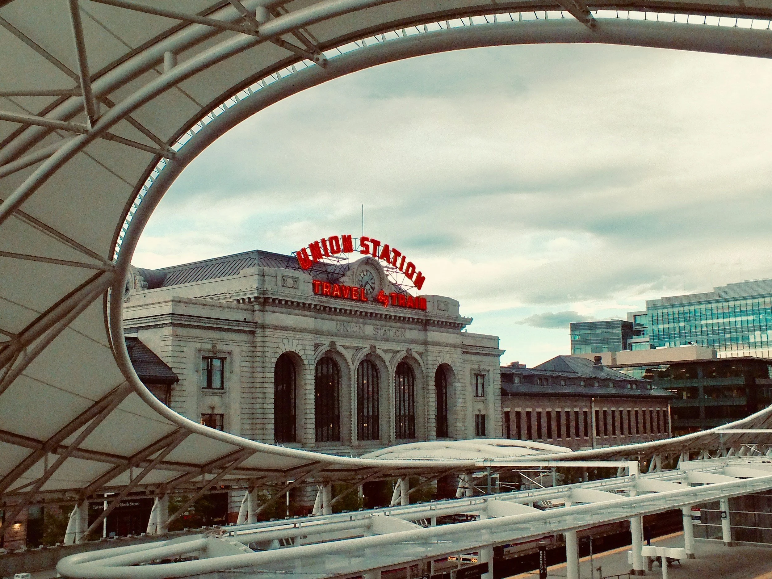 Exterior of Denver's Union Station Travel by Train sign