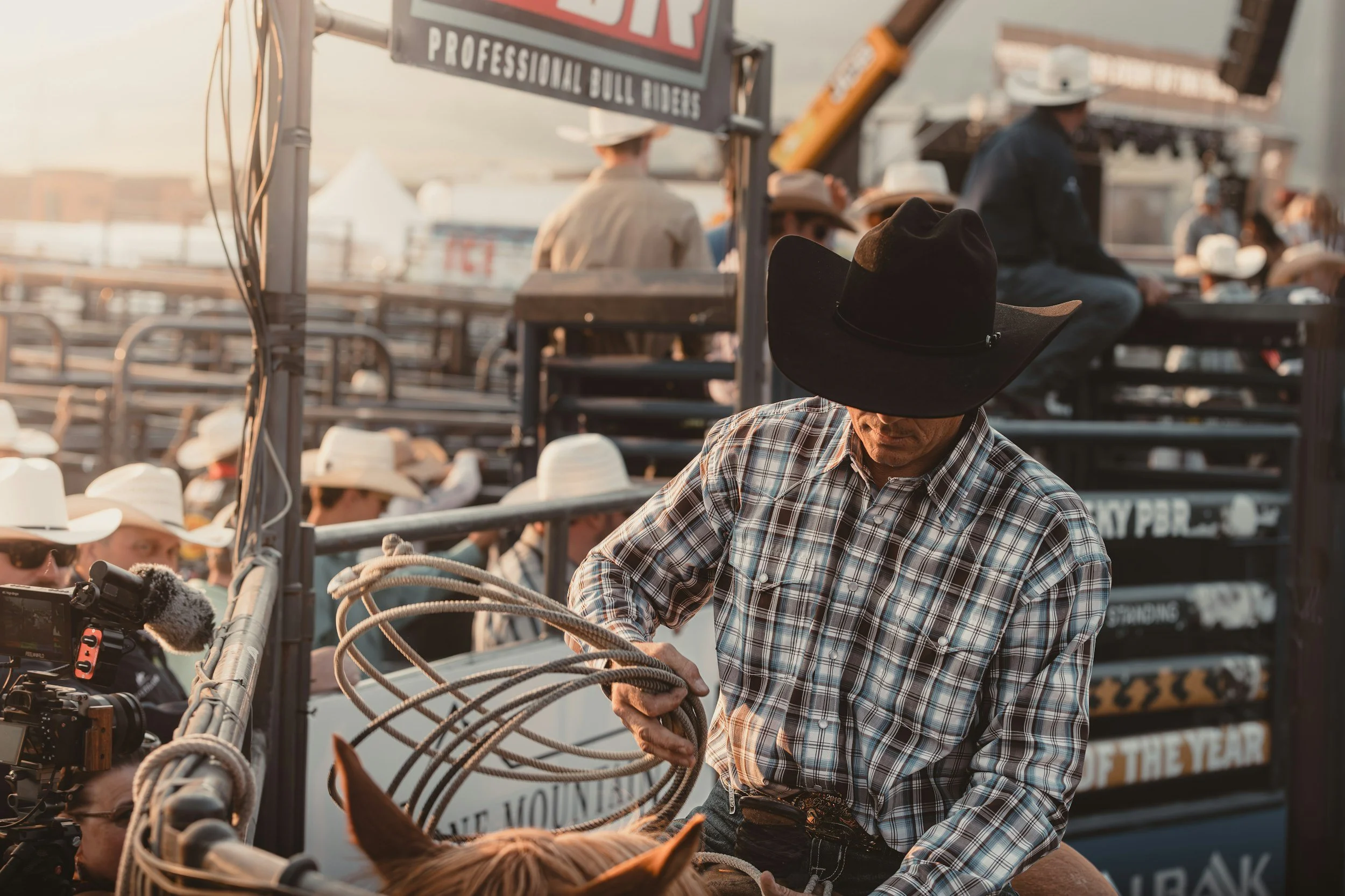 shot of a cowboy winding rope at a rodeo