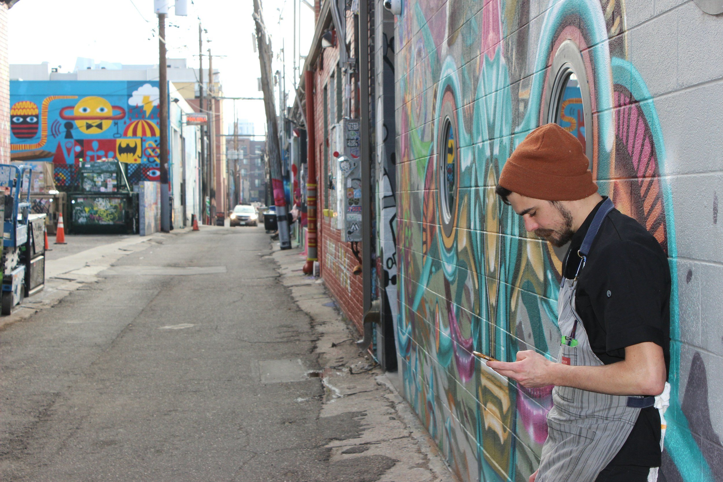 streetscape of RiNo neighborhoot showing murals in Denver