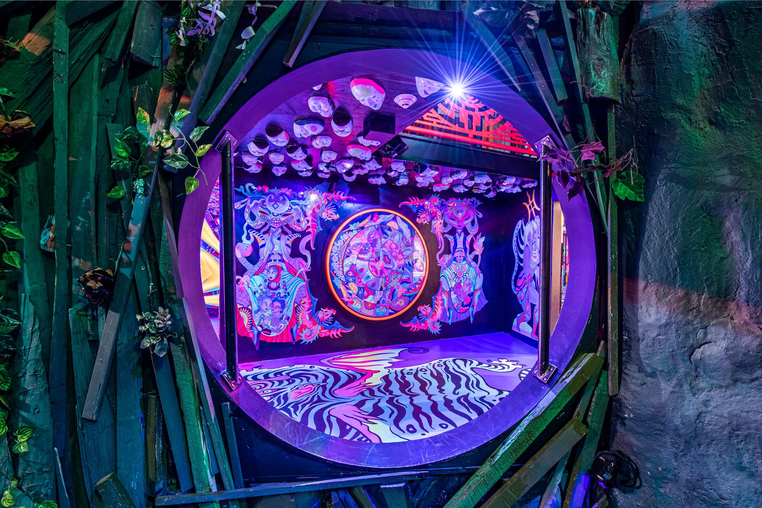 An artistic, trippy portal at Meow Wolf that brings you from one exhibit to the next