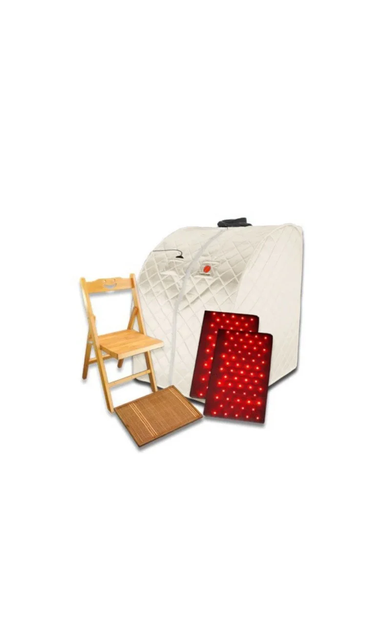 Portable infrared sauna with quilted fabric, wooden chair, wooden foot mat, and two red light therapy panels