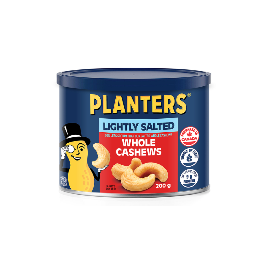 A can of Planters lightly salted whole cashews features a blue container with the brand name in yellow, a cartoon cashew character with a top hat, and images of cashews. The label indicates they are 200 grams, lightly salted, with 50% less sodium than salted cashews, and provides nutritional and certification info.