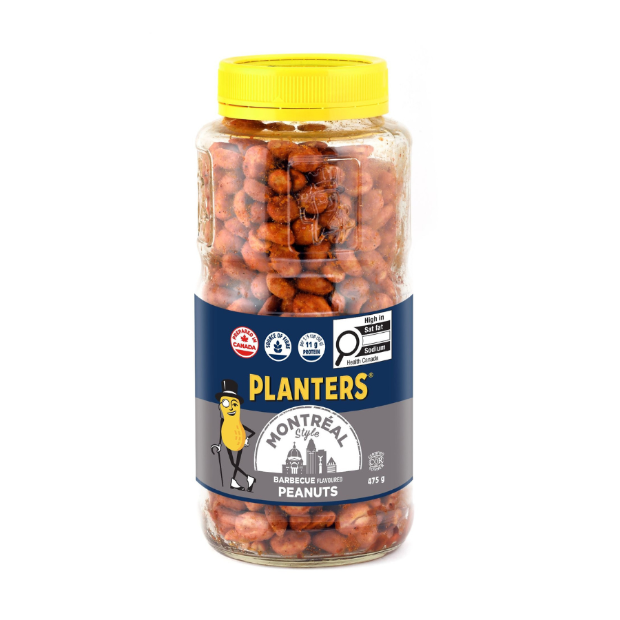 A jar of Montreal style barbecue-flavored peanuts with a yellow screw-on lid and a blue label.