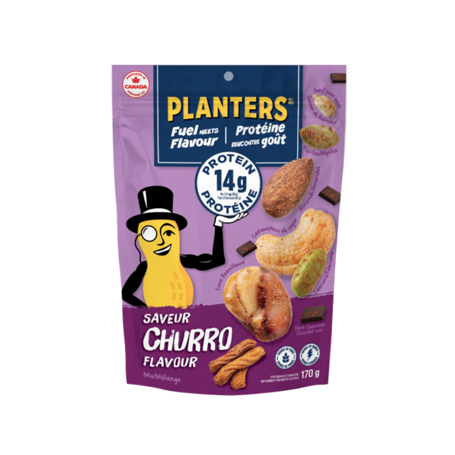 Purple snack packaging with the brand name 'Planters' and the flavor 'Churro.' It features an animated peanut character wearing a top hat, with images of churro-flavored snacks, chocolate pieces, and cinnamon sticks. The package indicates it contains 170 grams and has 14 grams of protein.