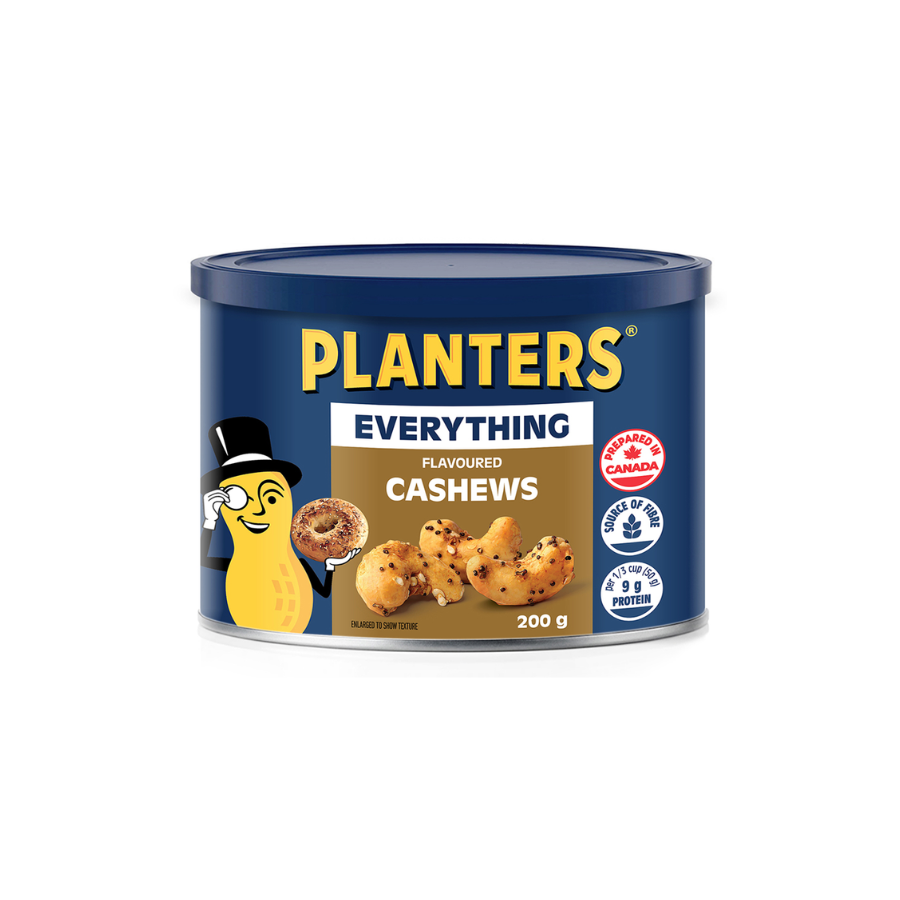 Canned Planters Everything Flavored Cashews with a cartoon peanut mascot wearing a hat and holding a cashew nut.